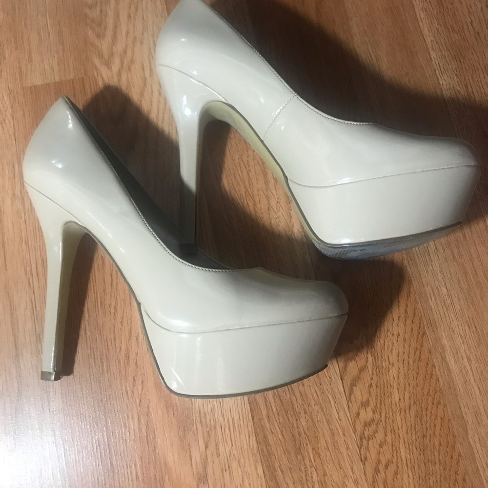 Nude heels by Carlos Santana